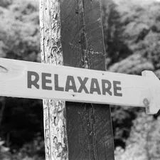 Sign with text shoot on film (Fomapan 200 BW) related to Unlocking Relaxation: The Benefits of Ceragem Massage Beds