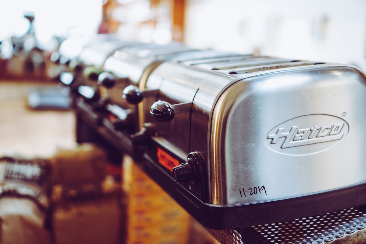 silver and black UNK electronic device related to Top Toasters for Your Kitchen