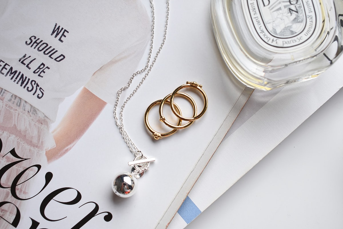 silver and gold bracelet on white paper related to Organize Your Treasures: The Ultimate Guide to Bed Bath and Beyond Jewelry Boxes
