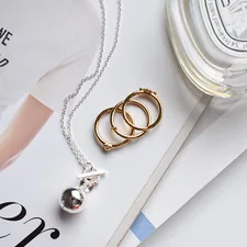 silver and gold bracelet on white paper related to Organize Your Treasures: The Ultimate Guide to Bed Bath and Beyond Jewelry Boxes