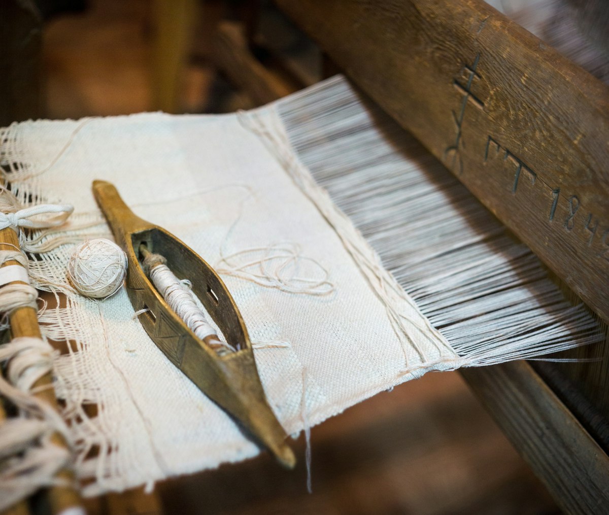 silver fish on white paper related to Antique Woven Coverlets
