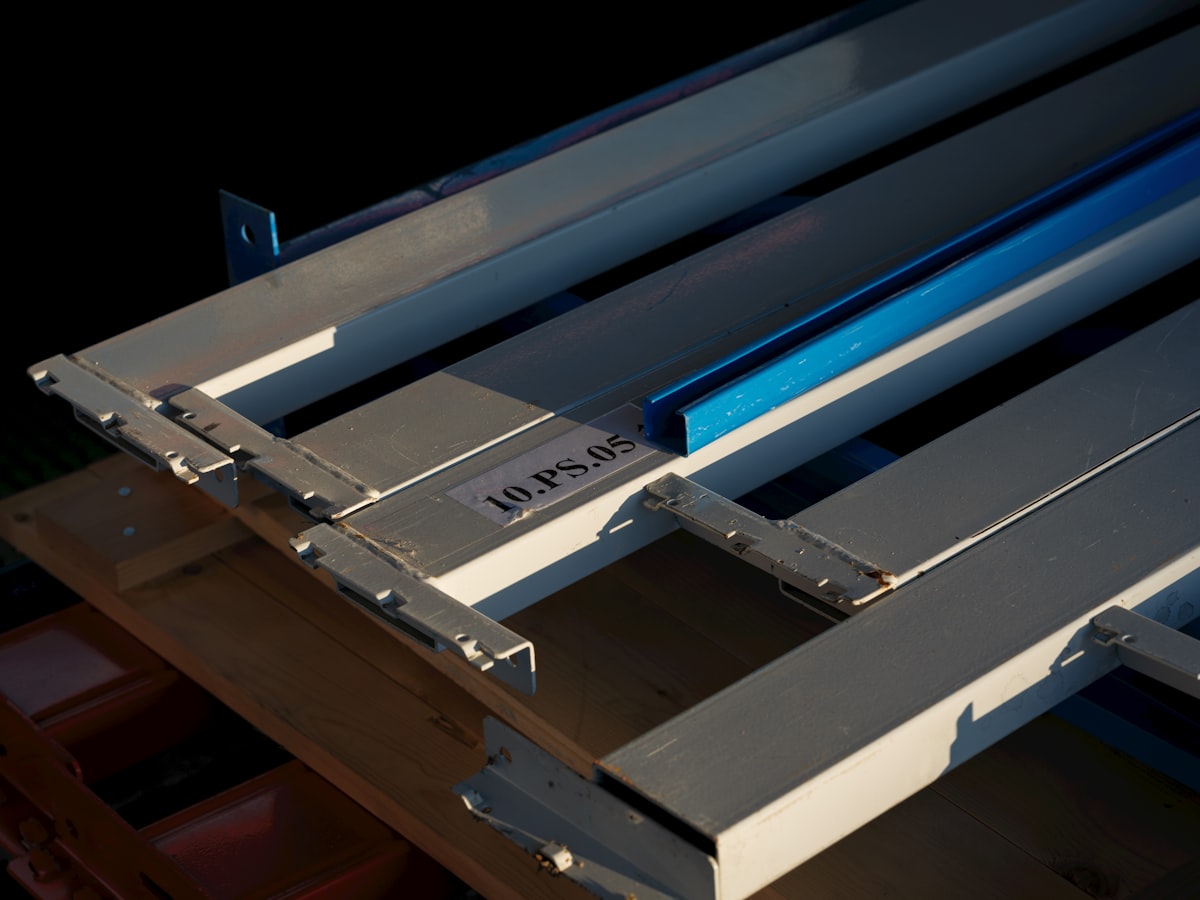 stack of metal beams related to Board Mounted Valance: Solutions for Style and Functionality