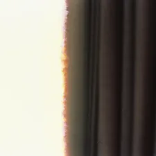 Sunlight filtering through dark curtains related to Chocolate Brown Valance Curtains