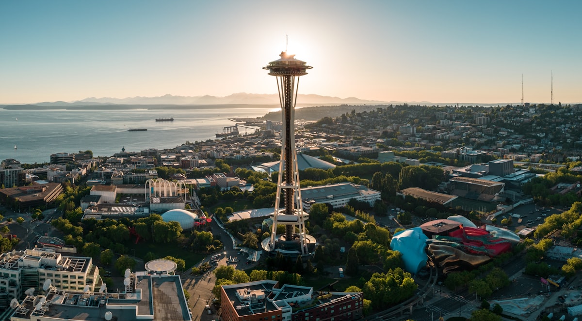 The Seattle Space Needle against Elliot Bay. Olympic National Park can be seen in the distance. 

This photo authorized via LAANC link to air traffic control, and operated under the FAA's Part 107 licensure. related to Transform Your Space with the West Elm Day Bed