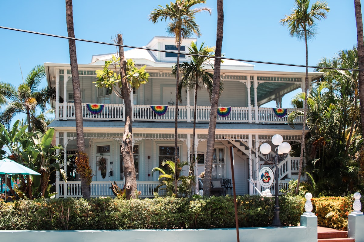 The Southernmost Point Guest House in Key West is an ocean view bed and breakfast in Key West, FL, located on the quiet end of world-renowned Duval Street. This house, with its elaborate Queen Anne style detailing, was built in 1894 by E. H. Gato, Sr. Soon after the house was built, Gato realized the rambling Victorian home was not getting the right sun exposure on his favorite porches, so he moved the house across the street. He had the huge structure rolled on logs pulled by mules. He also rotated the house to create the most favorable mix of sun and shade. related to Charming Stays in Paradise: Key West Bed and Breakfast