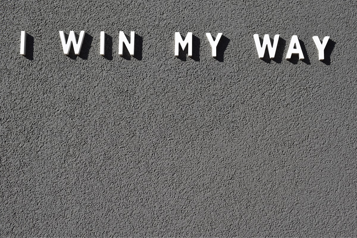 the words i win my way written on a wall related to Why the Dream On Me Classic Toddler Bed is a Perfect Choice for Your Little One