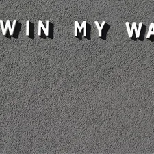 the words i win my way written on a wall related to Why the Dream On Me Classic Toddler Bed is a Perfect Choice for Your Little One