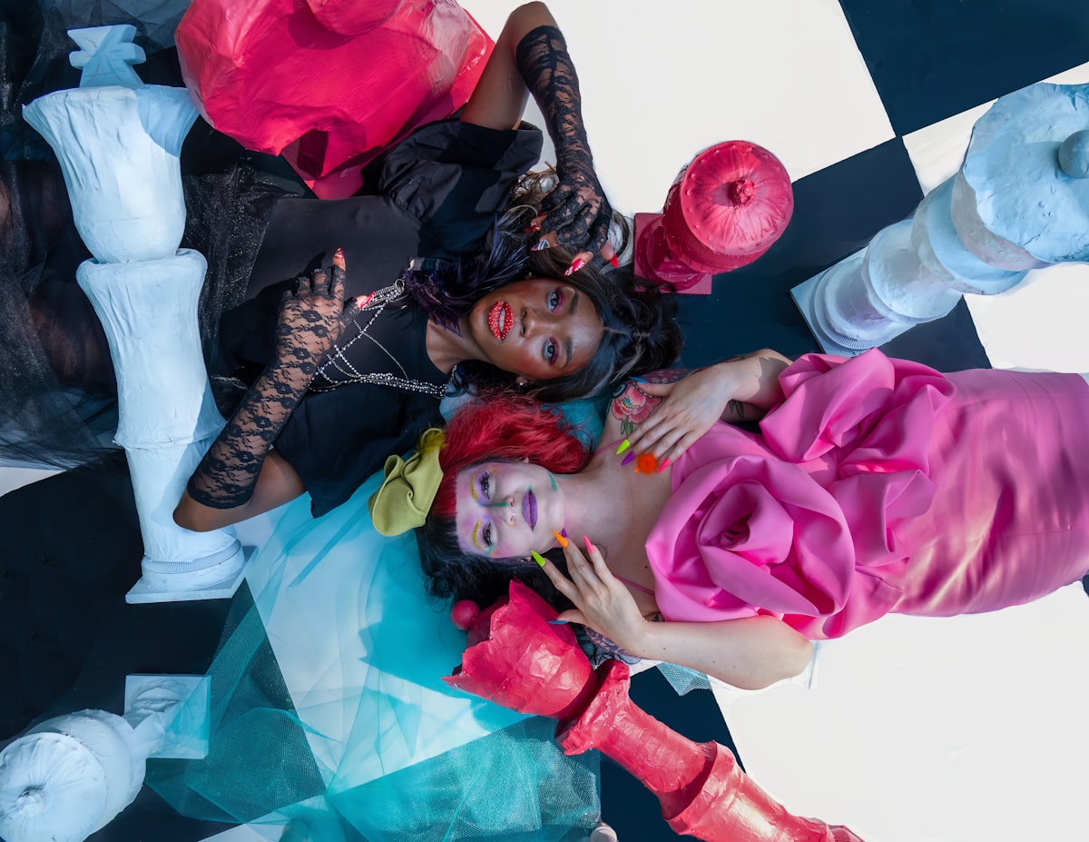 Title: Queen of Hearts and Chapelier fou Model: Facebook Cherry Lesly and Antoinette Ntambwe M.U.A: Facebook Charlotte Loridon and Kelly Rousse Hairstylist: Facebook Solene Jankovec and Marianne Léveillé Hats: Facebook Têtu-Têtu Artistic Direction: Facebook Moëv Kurdi Stylist: Facebook Max Valmont Accessories: Facebook Productions Jador and Viel Shop Design related to Dive into Whimsy: Explore the Delightful World of Alice in Wonderland Bedding