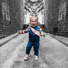 Toddler in a Chucky Outfit on Halloween related to Transforming Your Little One's Room with Boy Nursery Bedding Sets