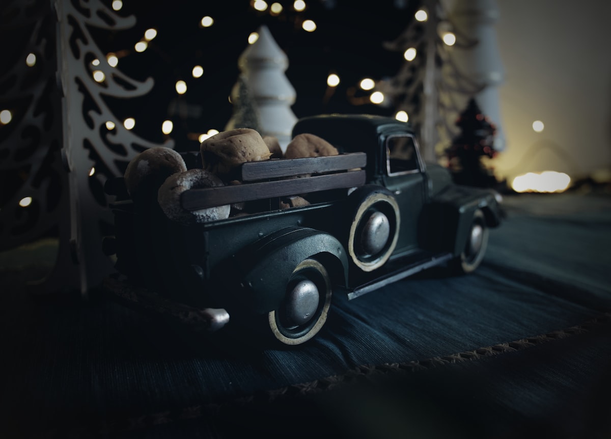 Toy truck full of mini donuts related to Rev Up Your Little One's Sleep with a Truck Toddler Bed