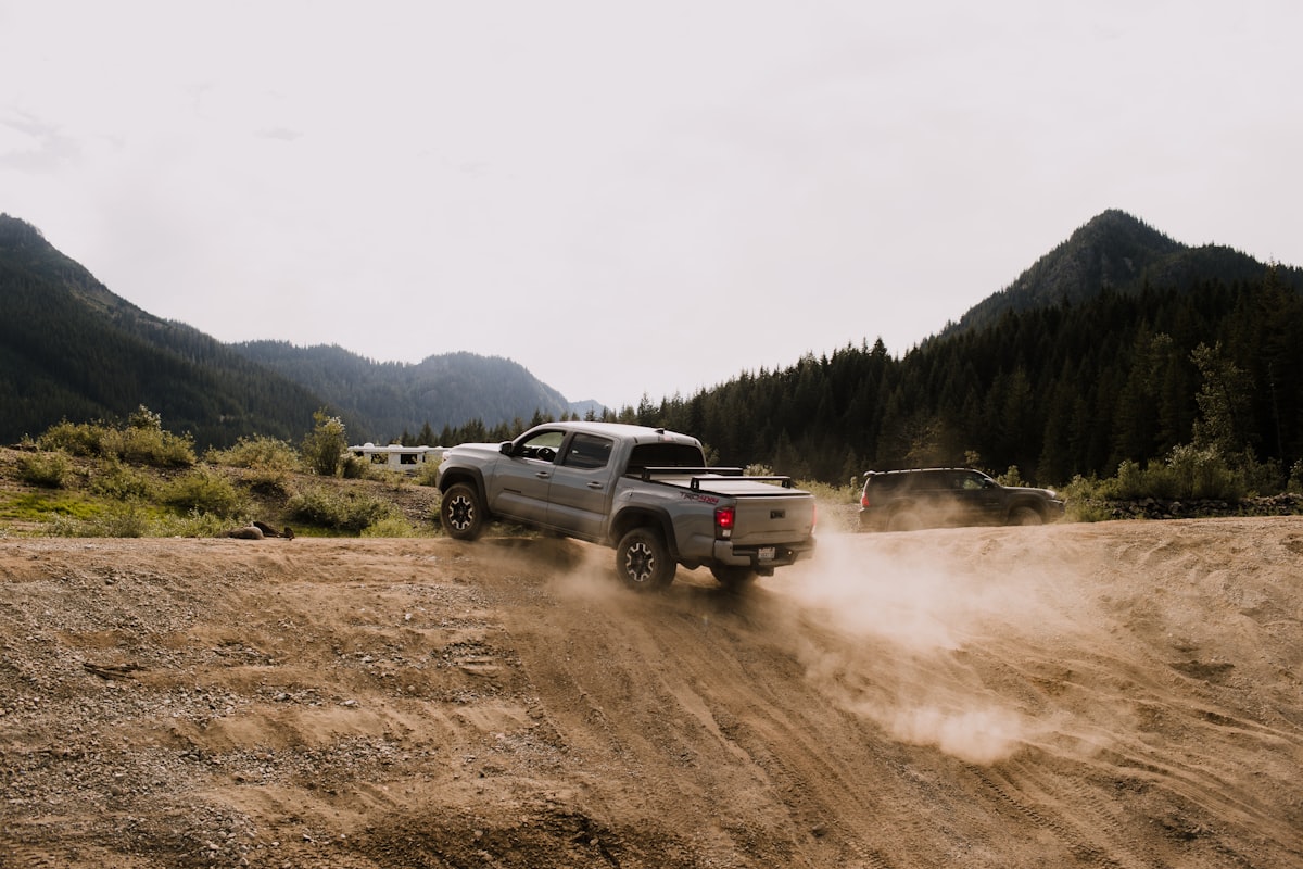 Toyota Tacoma driving off road in the Pacific Northwest in Washington related to Benefits of a Tacoma Bed Cage Installation