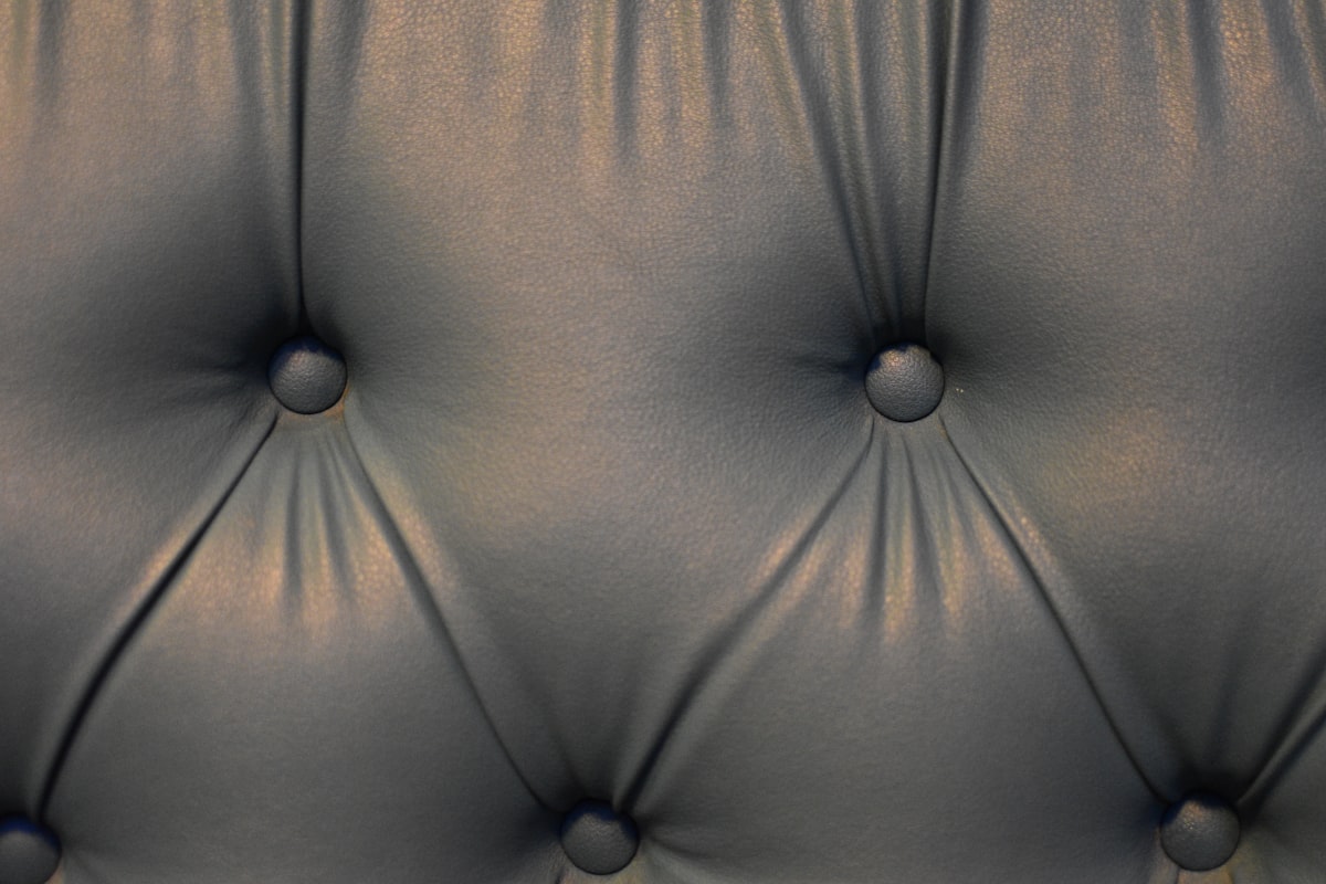 Tufted upholstery with buttons and a soft finish. related to Timeless Elegance of Grey Tufted Bed