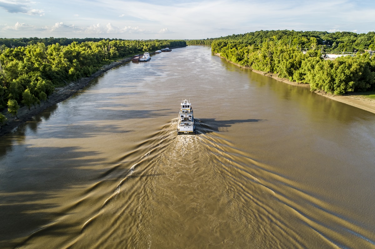 Tug going up the Yazoo River Diversion Canal towards the Port of Vicksburg. related to Charming Retreats on the Mississippi:  Discovering the Magic of Natchez Bed and Breakfasts