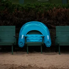 two green wooden armchairs related to The Ultimate Comfort Solution: Inflatable Couch Beds