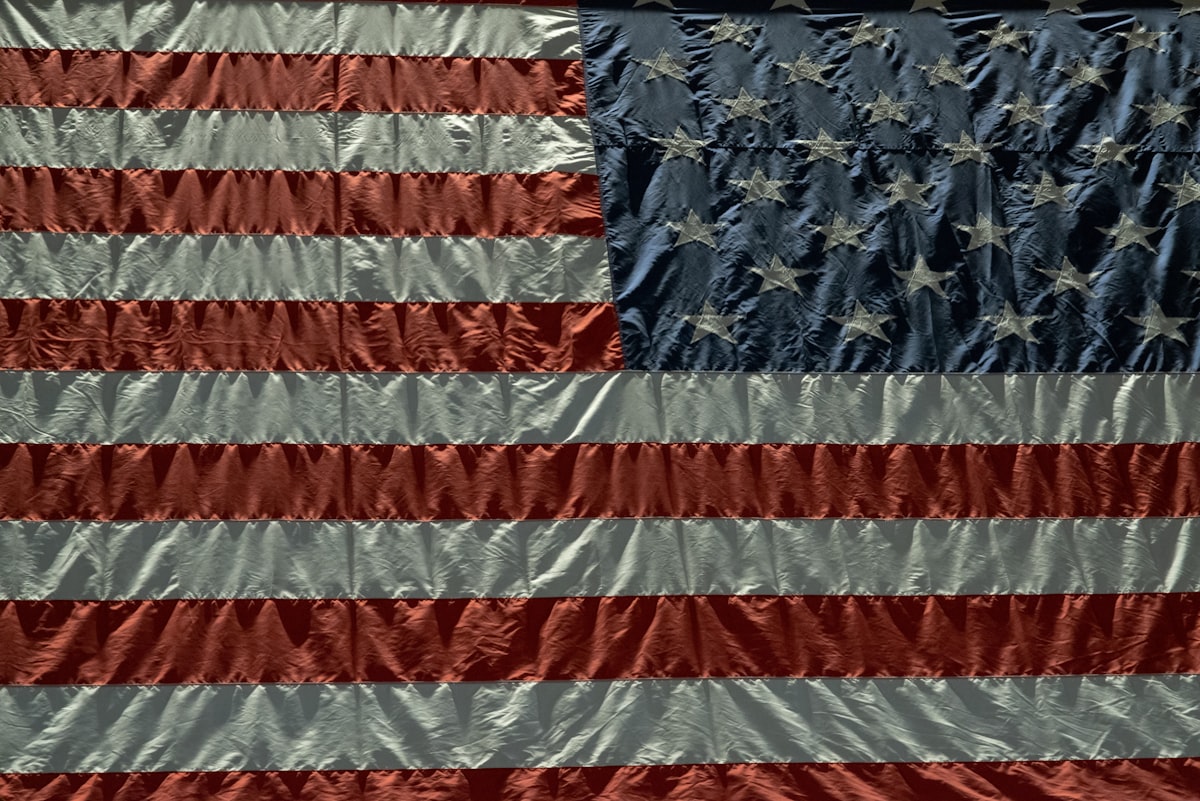 us a flag on white wall related to American Flag Bed Set: A Symbol of Patriotism in Your Home