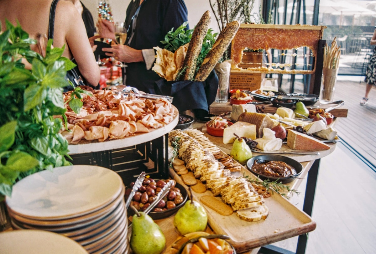 variety of food displayed on a table related to The Ultimate Showdown: Sideboard vs Buffet