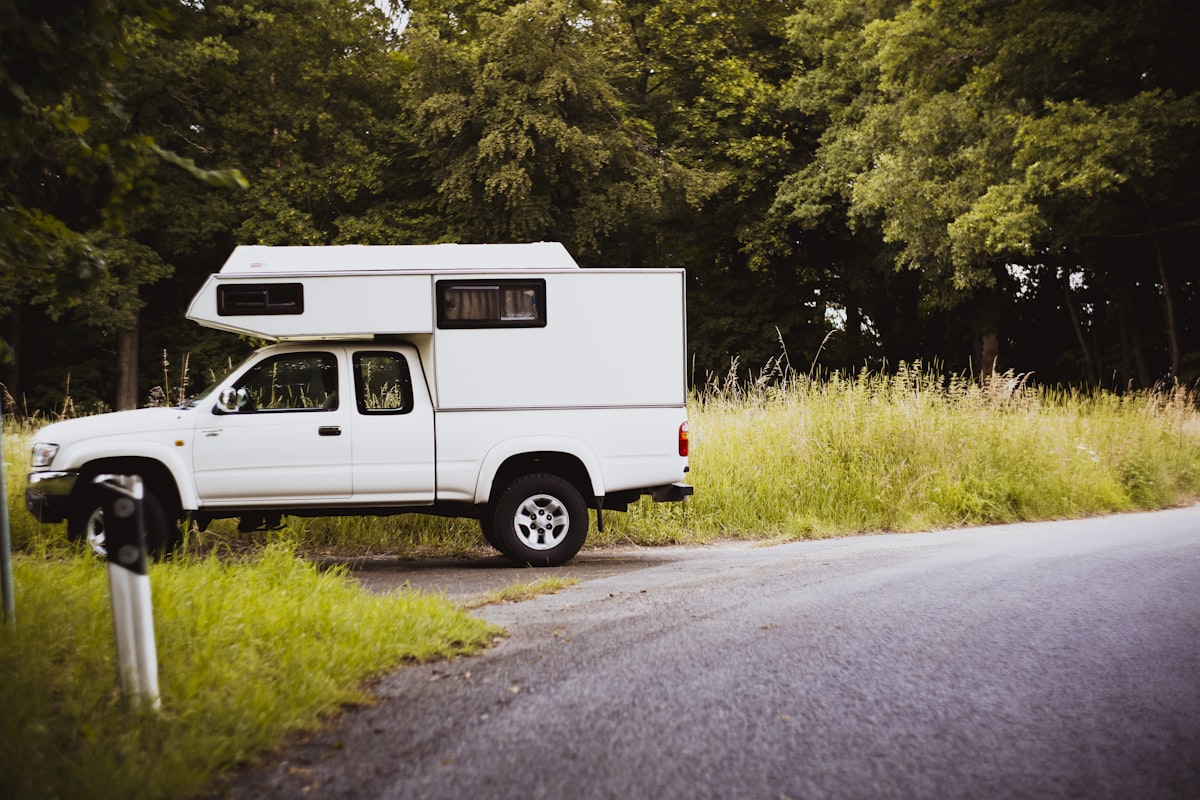 Vintage asia pick up with flexible camping build up. Made with analog vintage lens, Helios 44M 2.0 58mm (Year: 1977) related to The Ultimate Guide to Short Bed Truck Campers