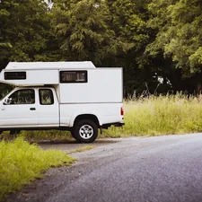 Vintage asia pick up with flexible camping build up. Made with analog vintage lens, Helios 44M 2.0 58mm (Year: 1977) related to The Ultimate Guide to Short Bed Truck Campers