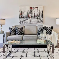 white and black polka dot throw pillow on white and black sofa related to 10 Elegant Decorating Ideas for Entryway Tables to Create a Lasting Impression