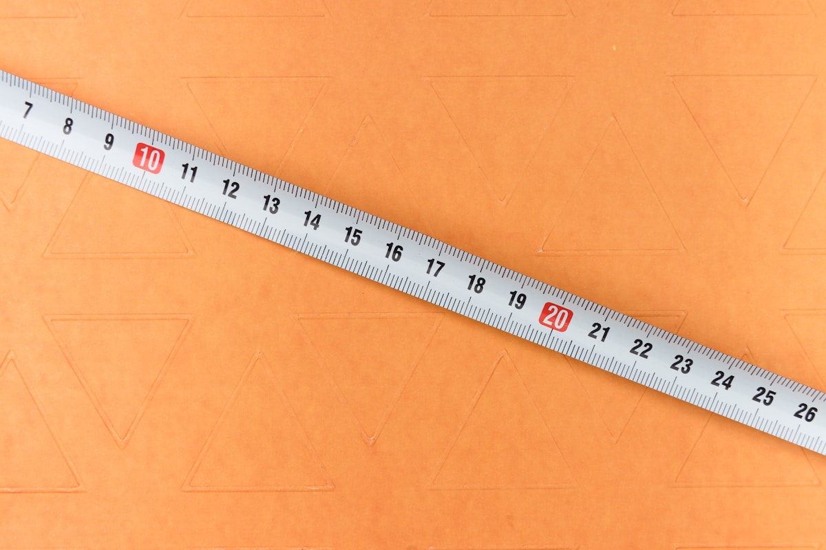 white and black ruler on brown surface related to Understanding Standard Valance Length