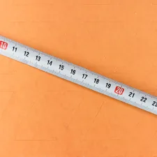 white and black ruler on brown surface related to Understanding Standard Valance Length