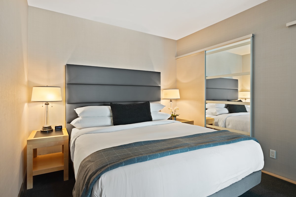 white and blue bed linen related to The Classic Comfort: Unveiling the Standard Queen Size Bed