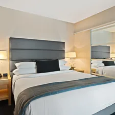 white and blue bed linen related to The Classic Comfort: Unveiling the Standard Queen Size Bed