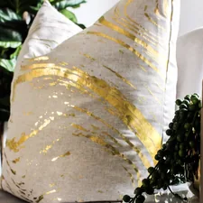 white and brown pillow related to Elevate Your Decor: The Luxe Appeal of Gold Valance Curtains