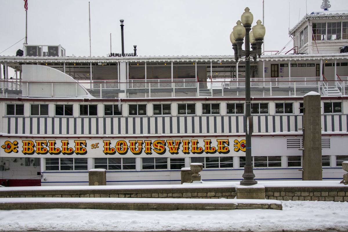 white and orange ship on dock during daytime related to The Ultimate Guide to Bed and Breakfasts Near Louisville, KY