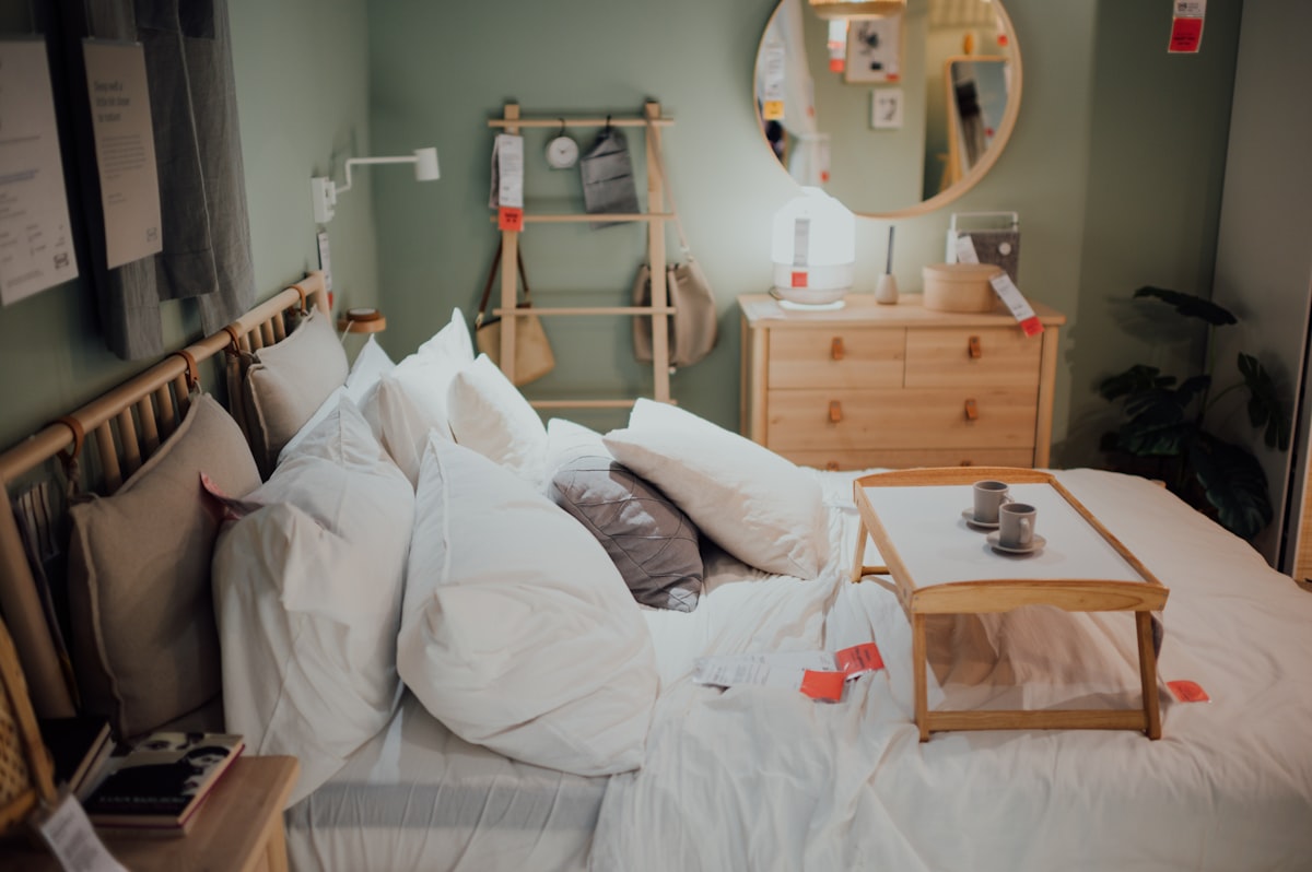 white bed pillows on bed related to The Ultimate Guide to Cheap Futon Beds