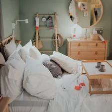 white bed pillows on bed related to The Ultimate Guide to Cheap Futon Beds