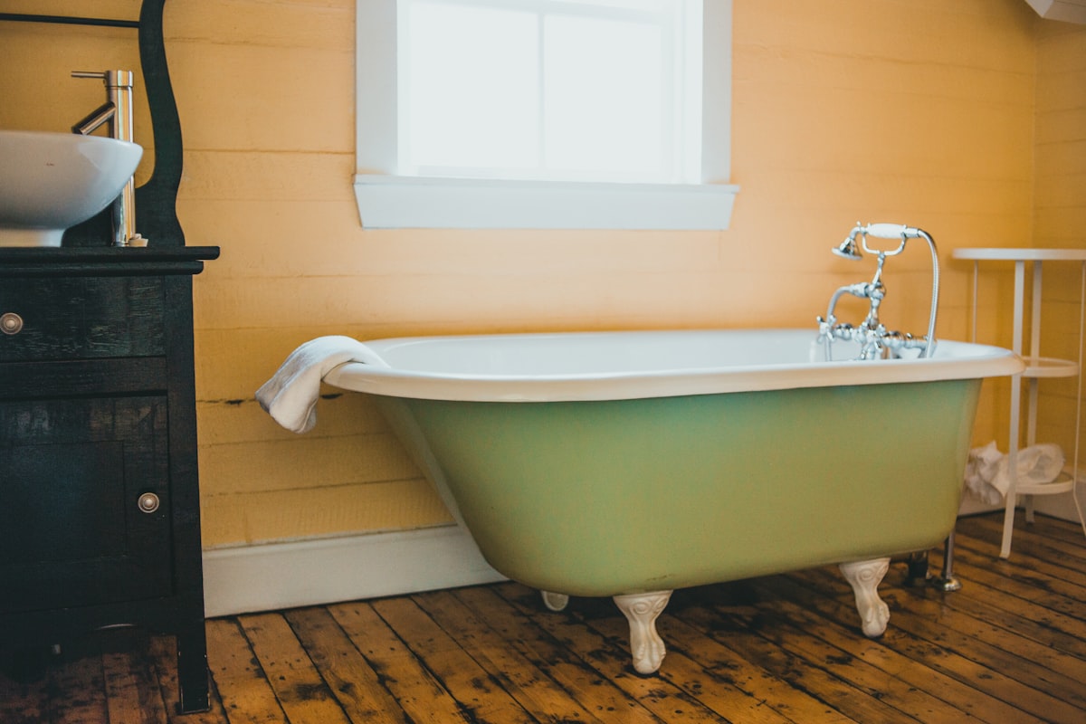 white ceramic bathtub near white wall related to Unlocking Savings with Bed Bath and Beyond Coupons