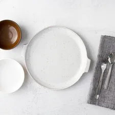 white ceramic plate beside stainless steel fork and bread knife related to Bed Bath & Beyond Dinnerware: Setting the Table for Every Occasion