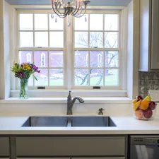 white ceramic sink with stainless steel faucet related to Kitchen Tiers and Valances: Elevate Your Kitchen's Style