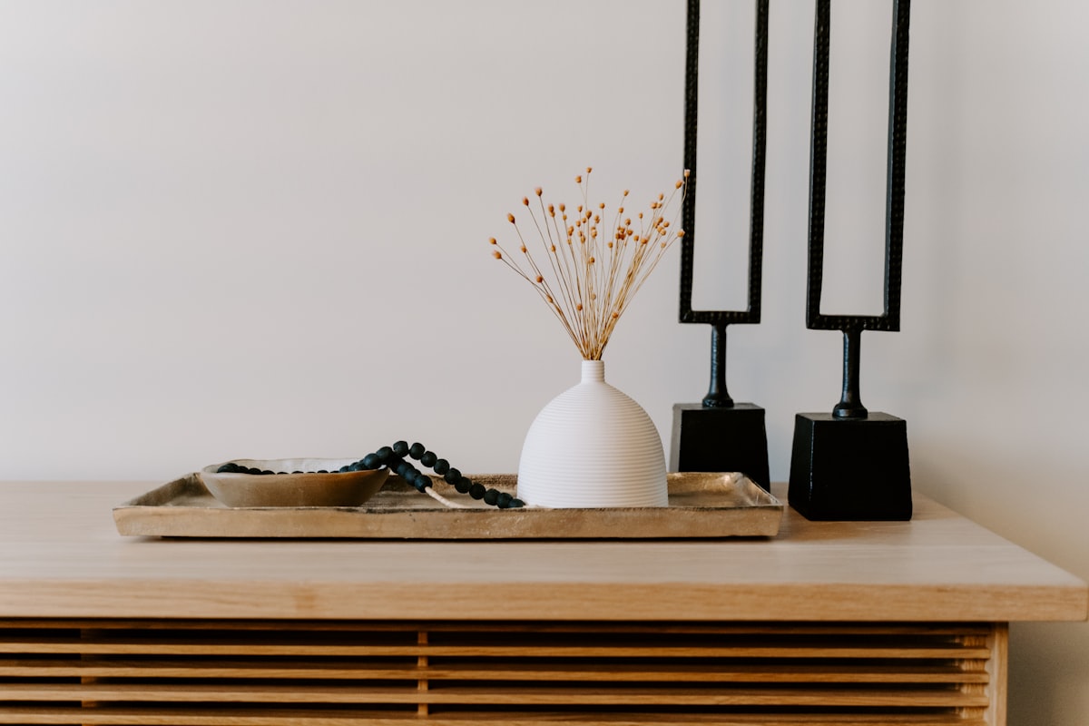 white ceramic vase near two black table decors related to Elevate Your Home Decor with Waverly Curtains and Valances