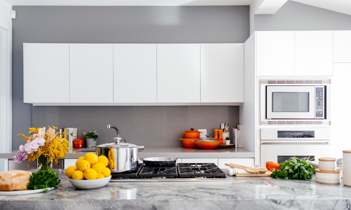 white over-the-range oven related to Elevate Your Kitchen Style: Essential Kitchen Cabinet Valance Ideas