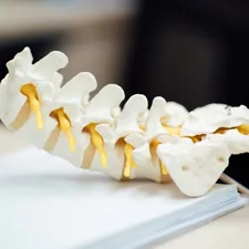 white pasta on white paper related to Effective Solutions for Spine Relief During Sleep