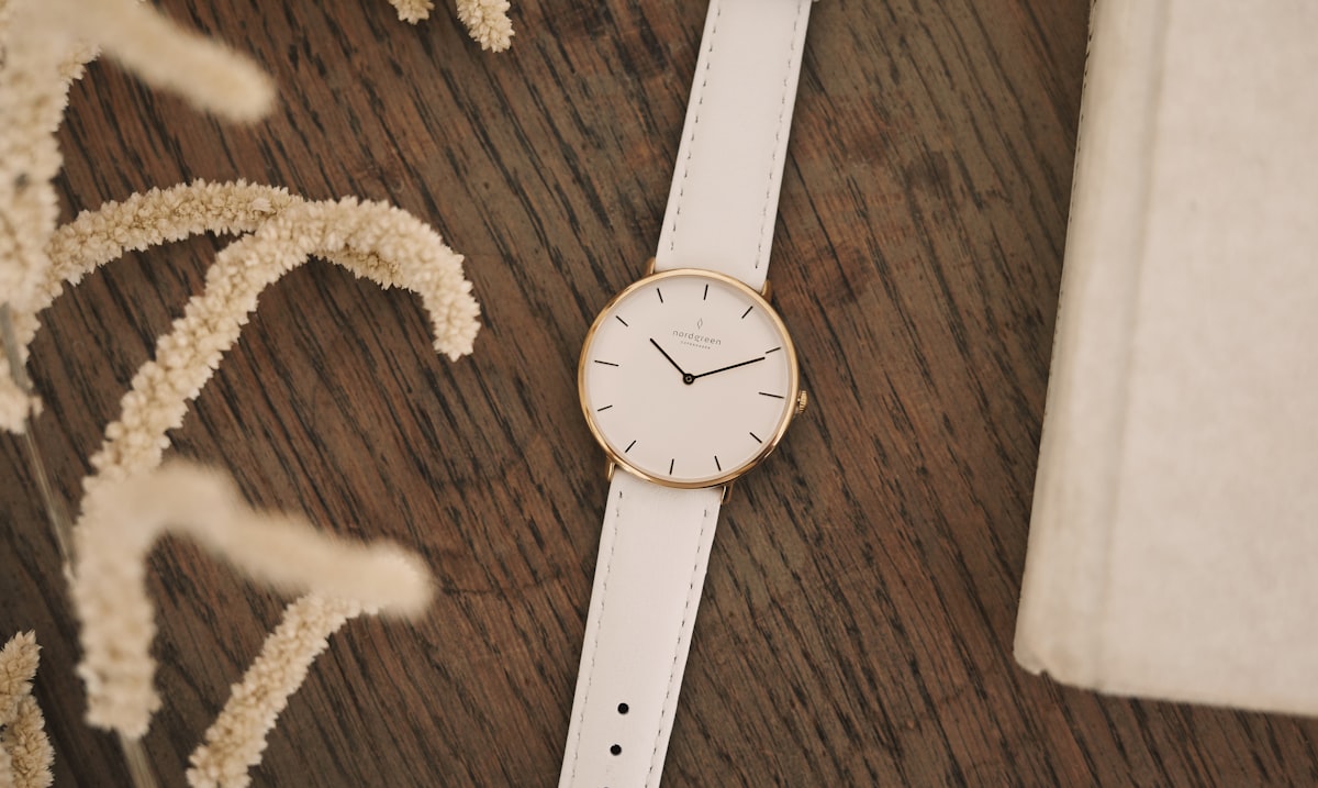 white round analog watch at 10 10 related to Elegant Simplicity: The Timeless Allure of Black and White Kitchen Valances