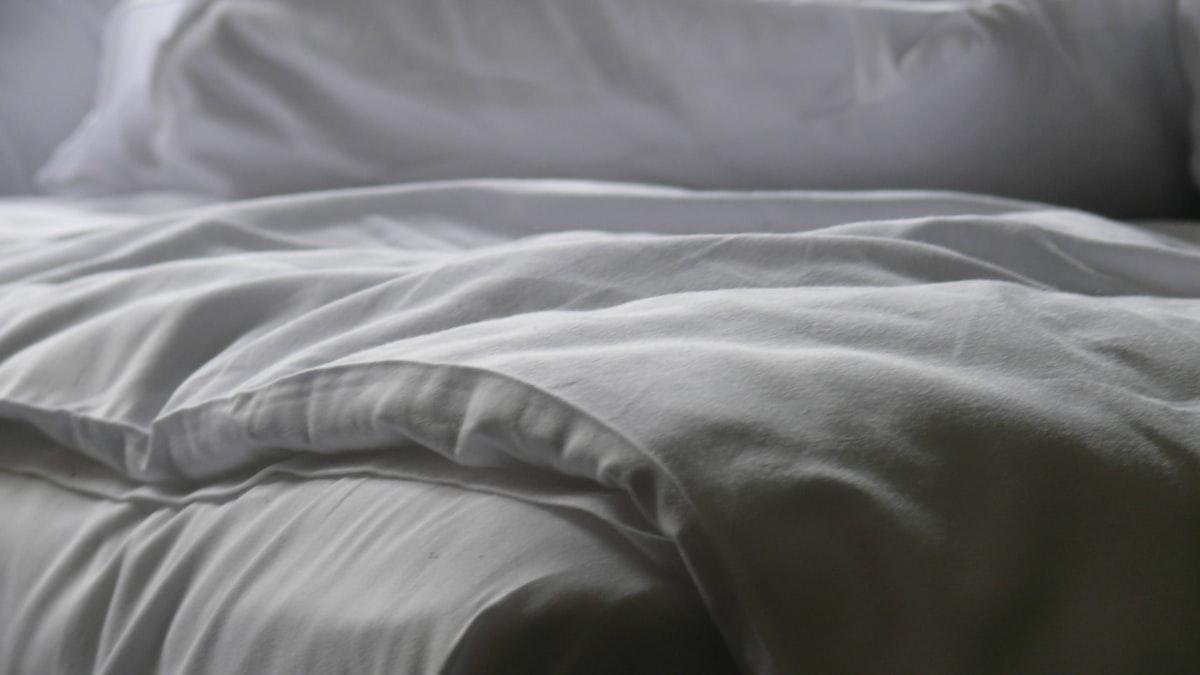 white textile on black textile related to Twin Coverlet Set