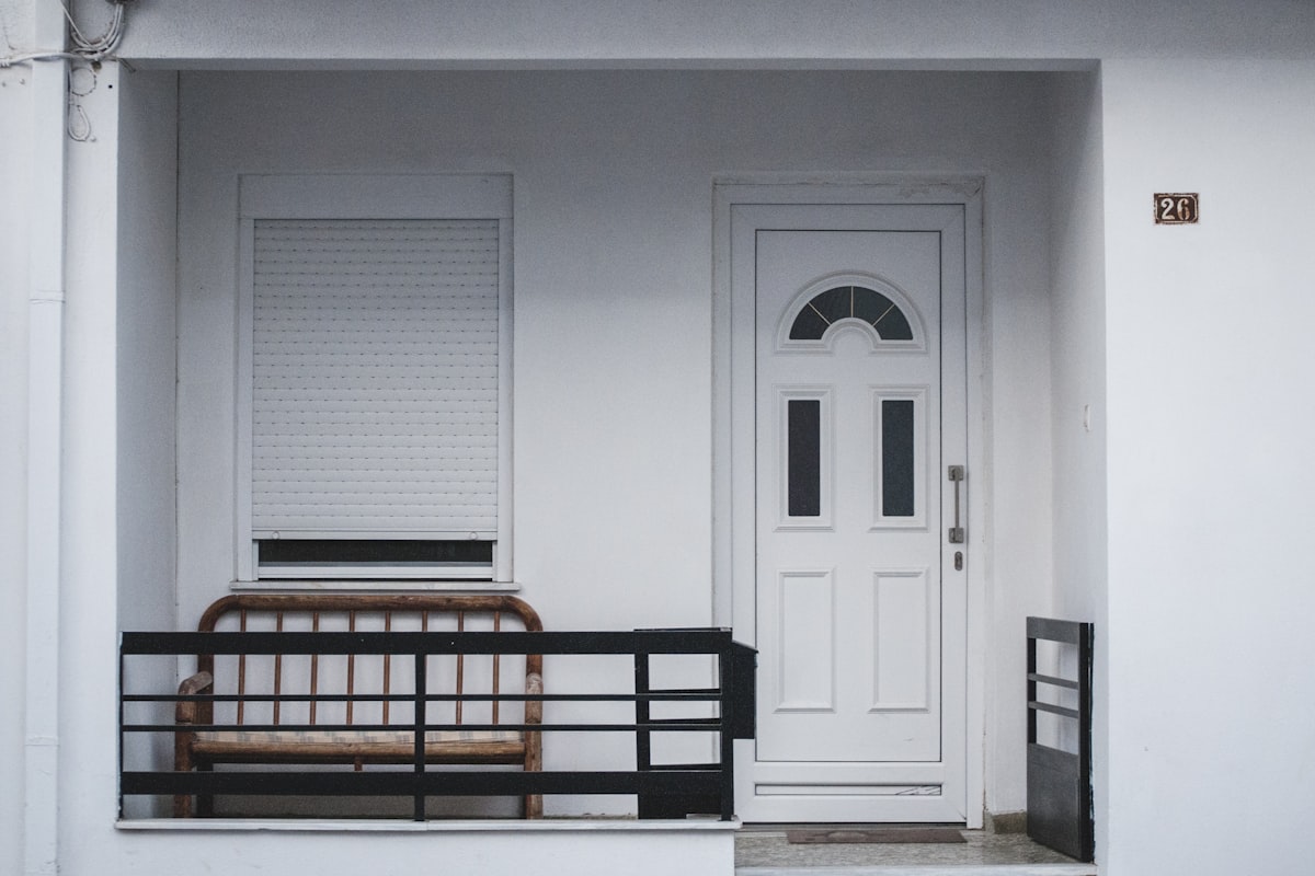 white wooden 4-panel door related to Enhance Your Home's First Impression with a Timeless White Entryway Bench