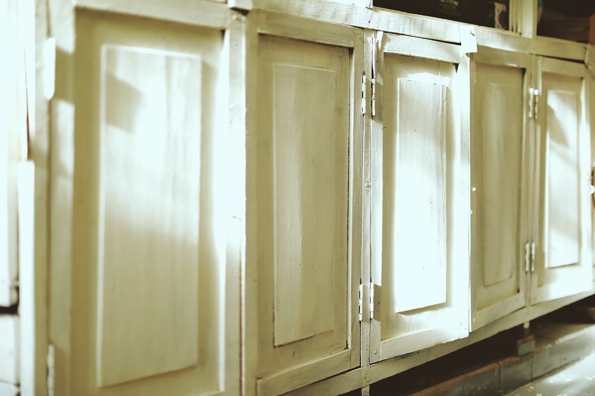 white wooden cabinet with mirror related to Kitchen Cabinet Valance