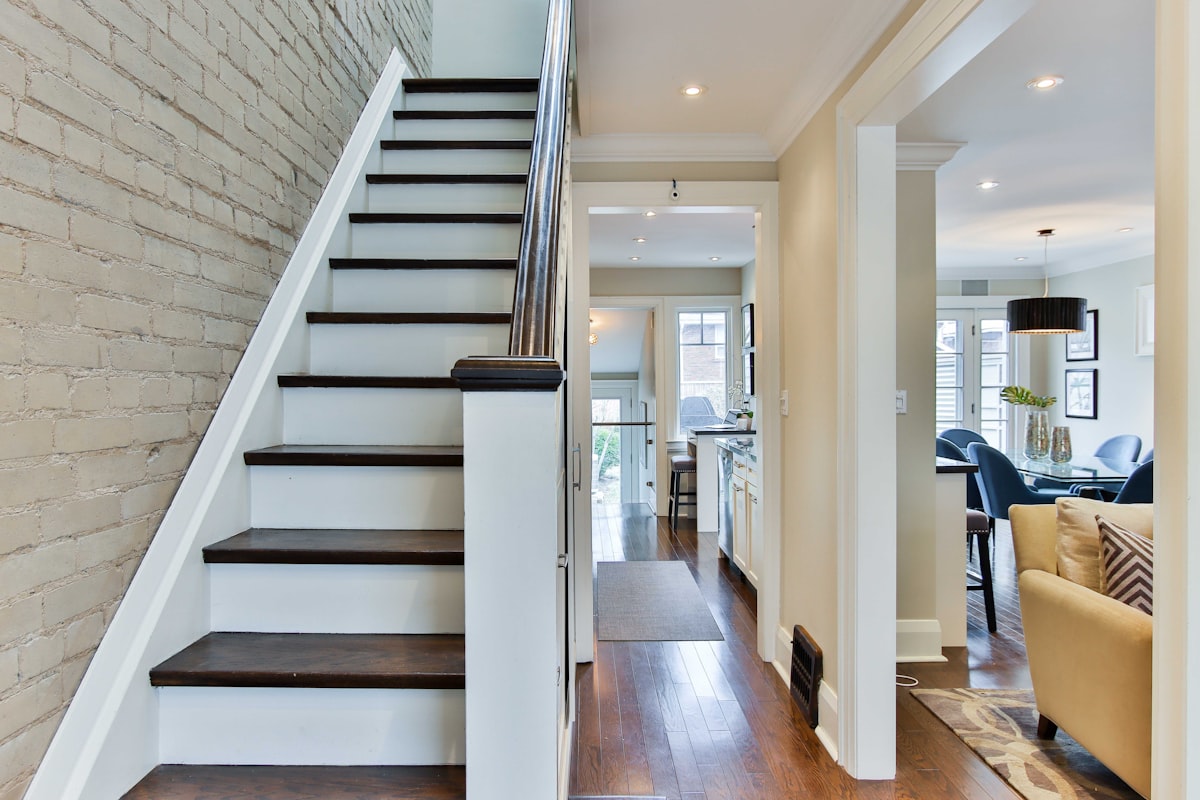 white wooden door near staircase related to Sew Stylish Homes: A Step-by-Step Guide on How to Make Valance Curtains