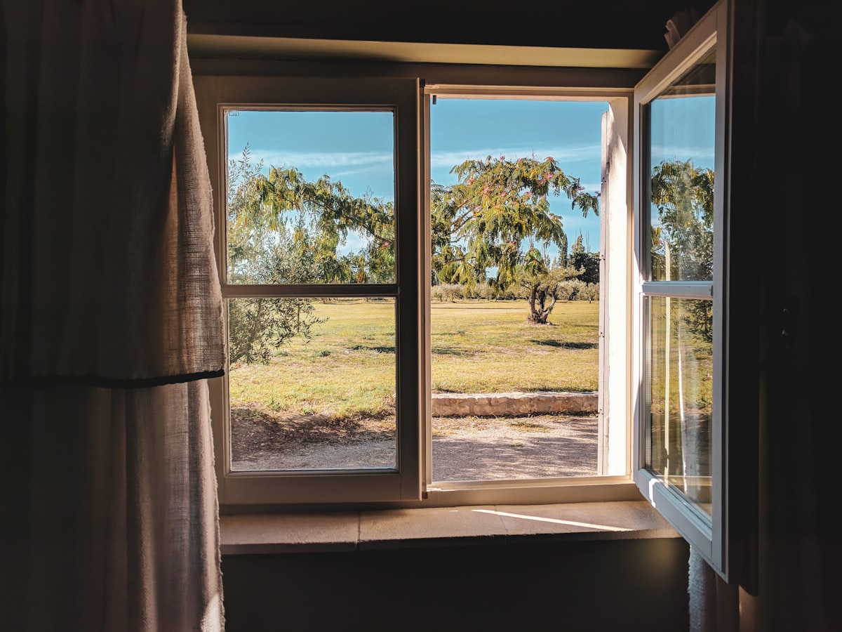 white wooden framed glass window related to Elevate Your Windows with Country Window Valances