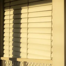 Window blinds cast shadows in the sunlight. related to Mastering Valance Window Treatments: A Guide to Measuring Like a Pro
