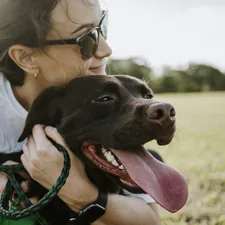 woman hugging a dog related to Find the Best Comfort for Your Dog