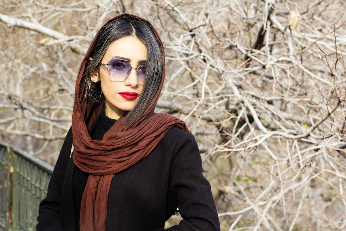 woman in black long sleeved shirt and brown scarf related to Brown Scarf Valance
