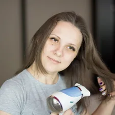 Woman looking at the camera and while drying her hair with hair dryer. More of my photos and videos Adobe Stock:http://bit.ly/3RqlciK More of my photos and videos Shutterstock: https://www.shutterstock.com/g/ALEKSANDRBERDYUGIN My email: bermix999@gmail.com related to Ultimate Guide to Bed Head Hair Stick