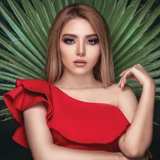 woman wearing red dress related to The Elegance of Pleats: Unlocking the Beauty of Pleated Valance Patterns