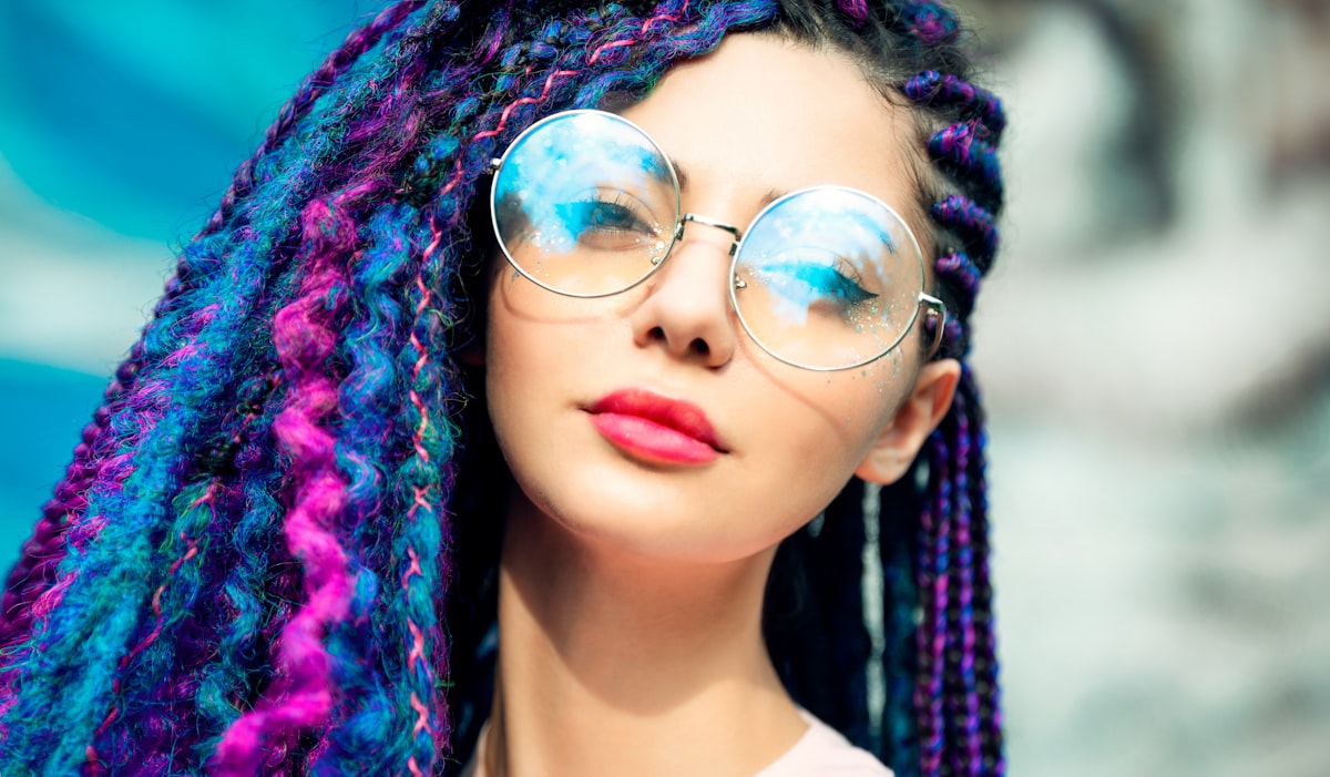 woman wearing silver framed aviator style sunglasses related to Vibrant Styles with Multi Colored Valances