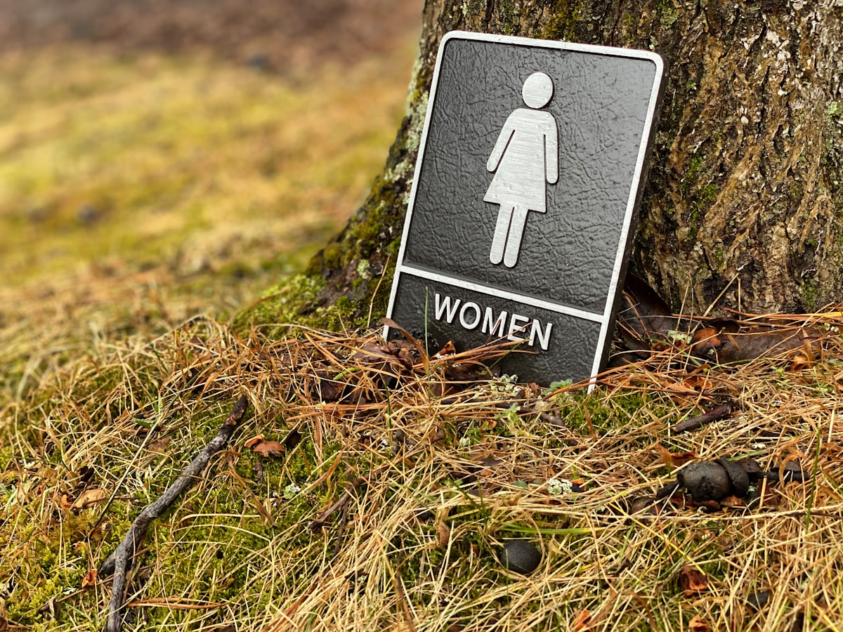 women signage related to How to Stop Peeing in the Bed: A Comprehensive Guide